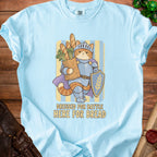 Cat knight holding a bag of bread and a shield, text says "Dressed for Battle Here for Bread".
