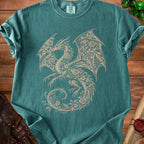 Teal t-shirt with a beige floral dragon graphic and "Comfort Colors" tag.
