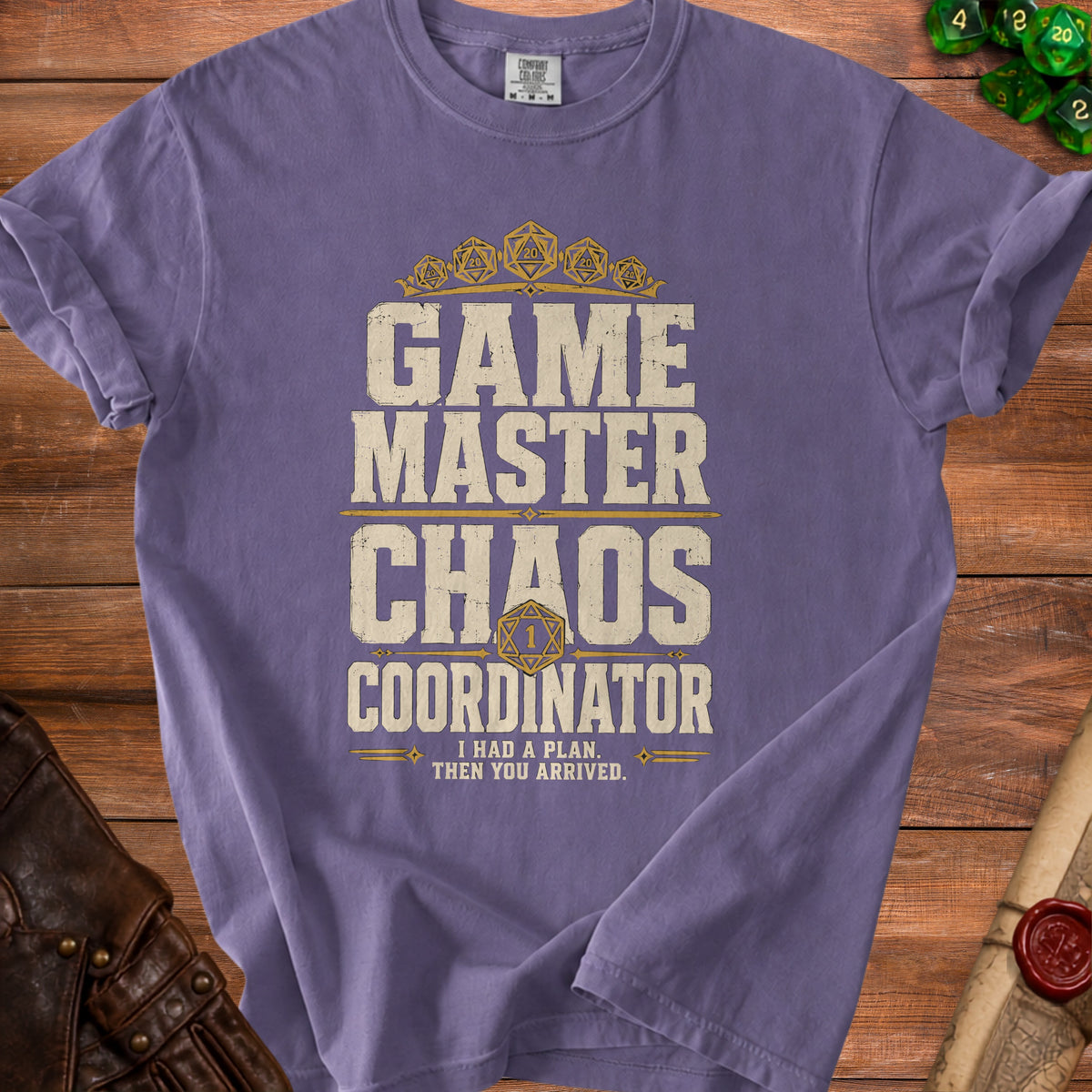 Purple t-shirt with "Game Master Chaos Coordinator" and quote text.