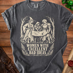 Dark grey t-shirt with "Women With Excellent Bad Ideas" text and fantasy illustration.