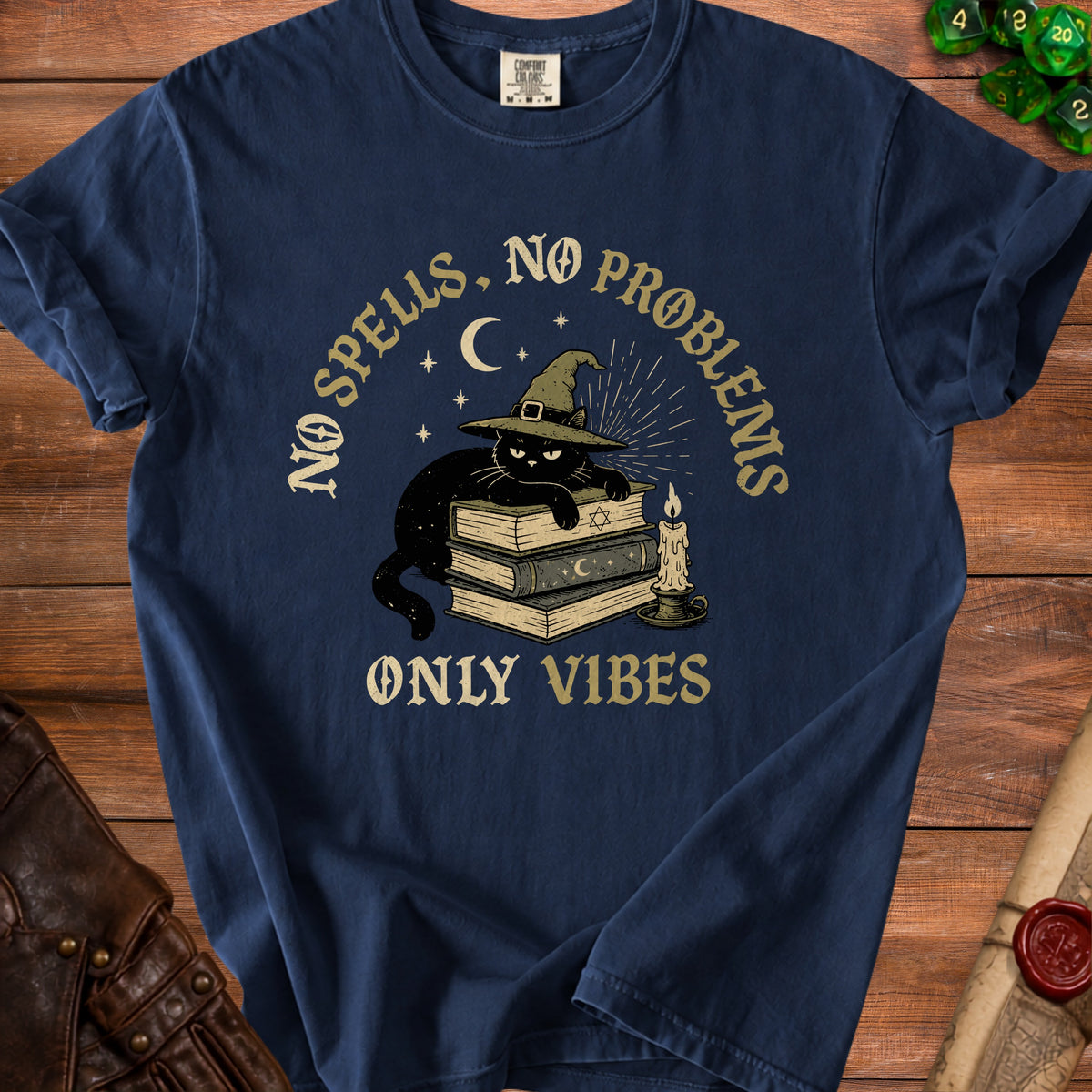 Black cat in witch hat on books with text "No Spells, No Problems, Only Vibes."