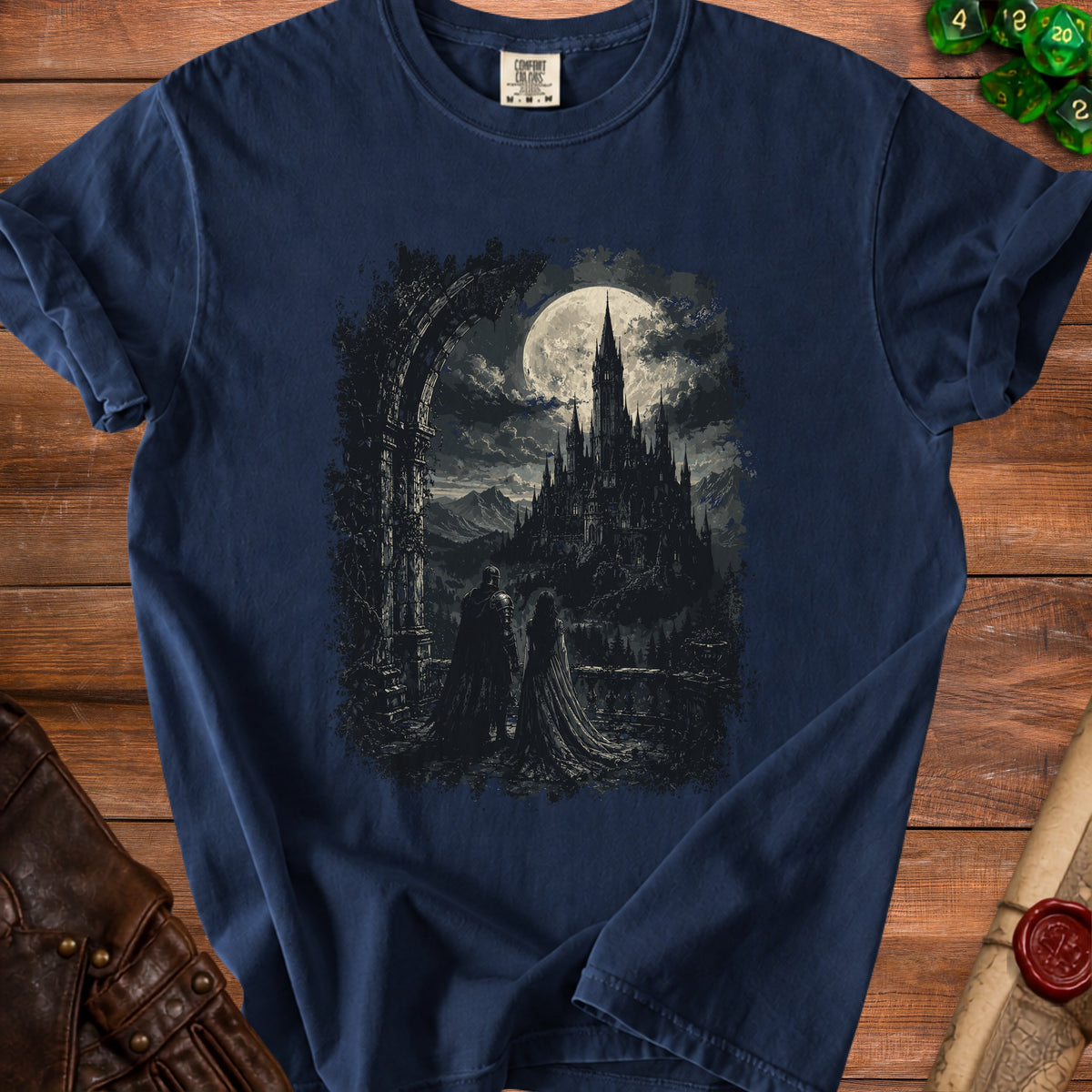 Dark t-shirt with gothic castle and figures under a full moon graphic.