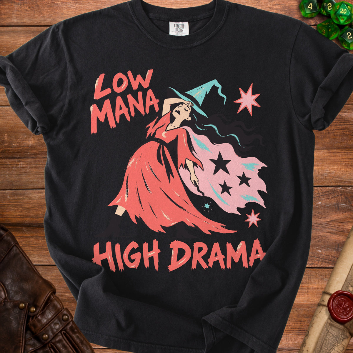 Black t-shirt with "Low Mana High Drama" text and a stressed witch graphic.