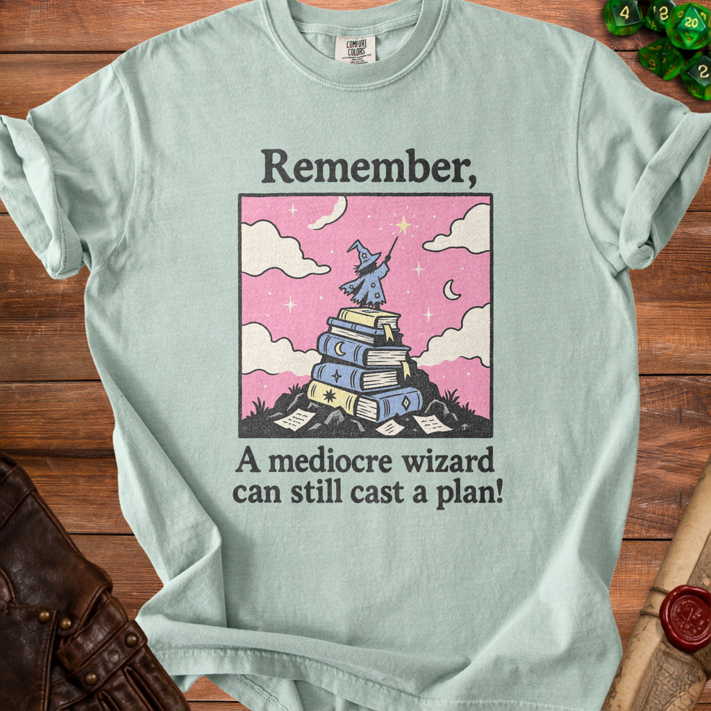 T-shirt with "Remember, a mediocre wizard can still cast a plan!" text and graphic.