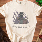 Cream t-shirt with black cat entangled in yarn, saying "All you had to do was pay us enough to live."