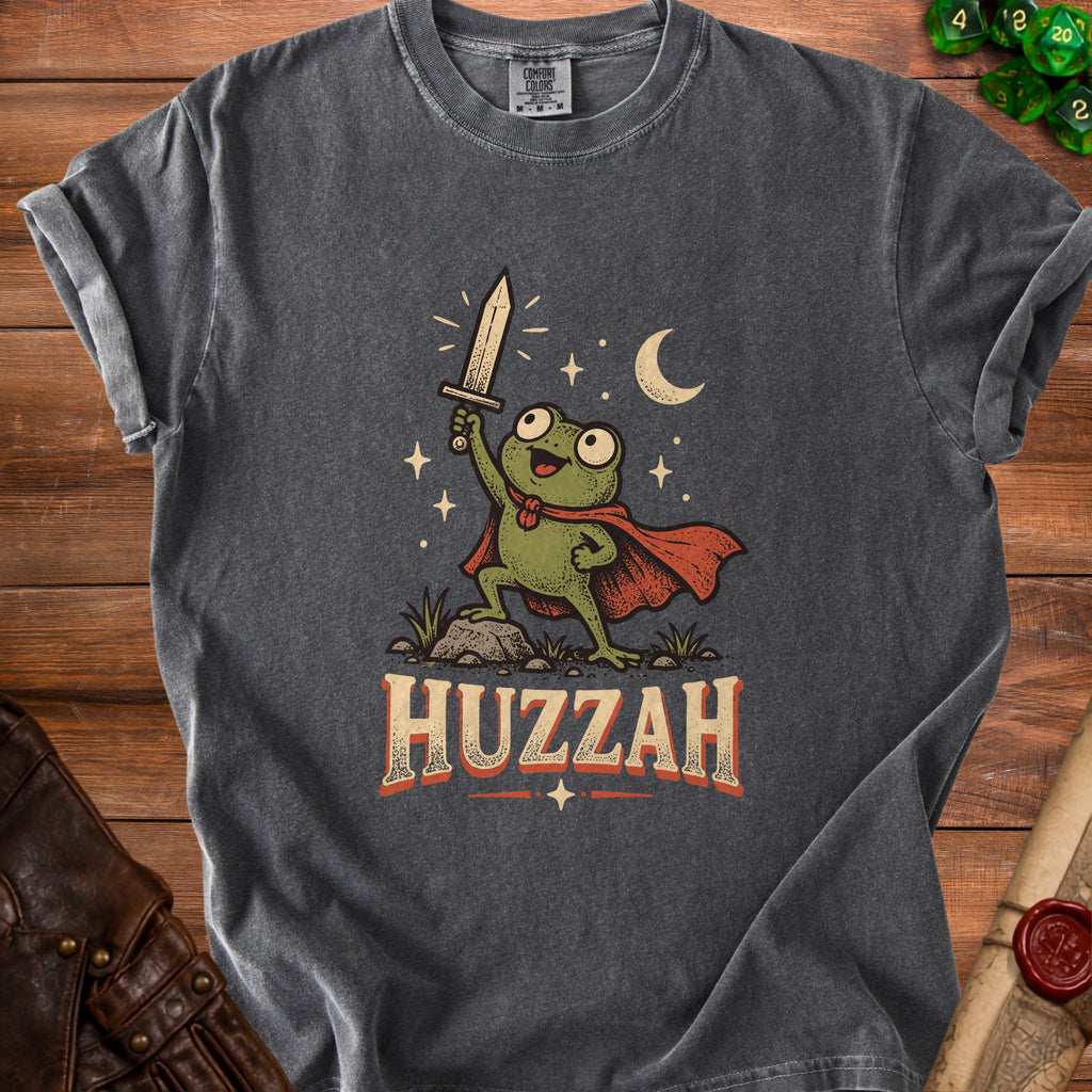 T-shirt with a frog character holding a sword with the word HUZZAH below.