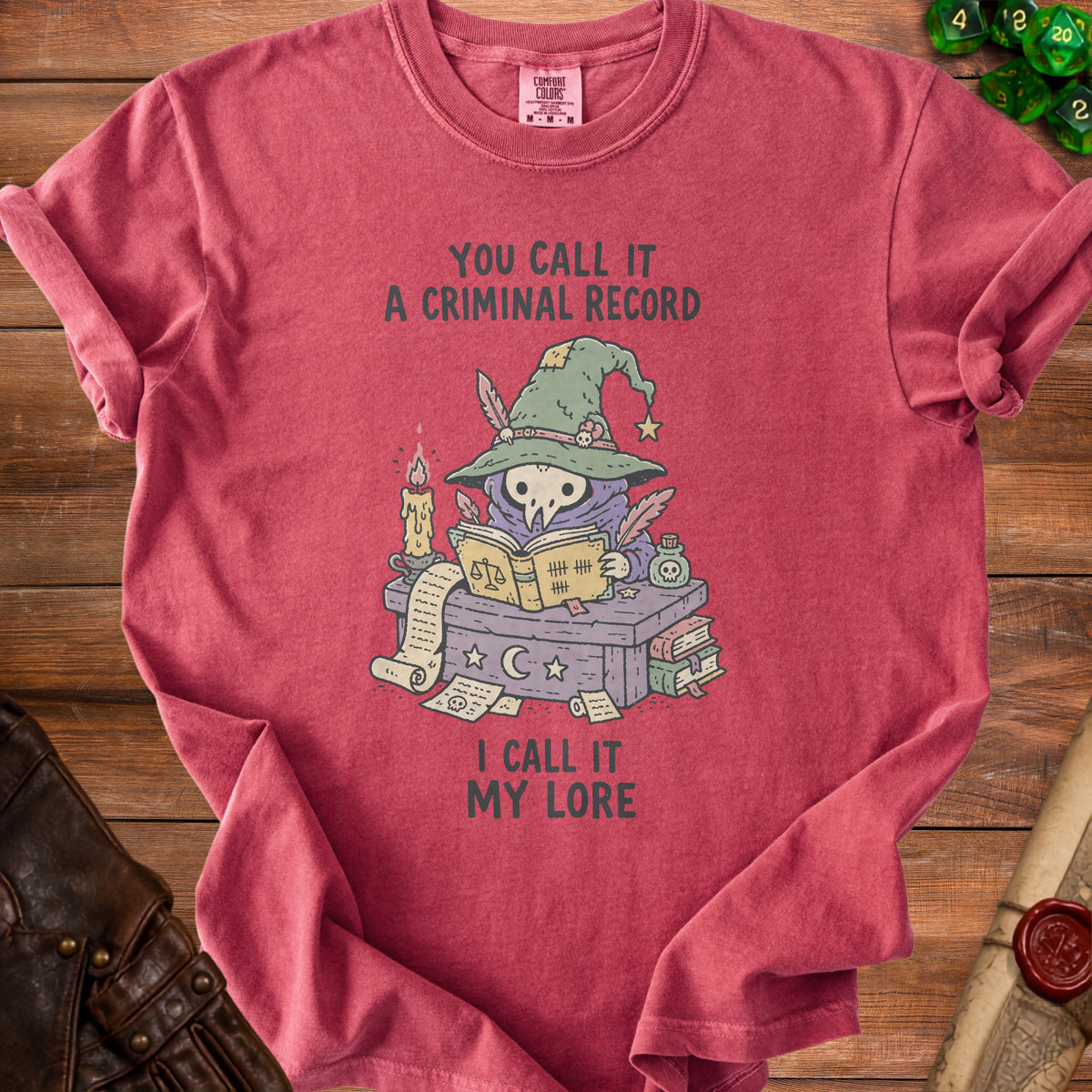 Red t-shirt with plague doctor bird reading, "You call it a criminal record, I call it my lore."