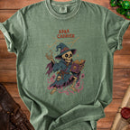 Green t-shirt with a skeleton wizard and text "Abra Cadaver" printed on it.