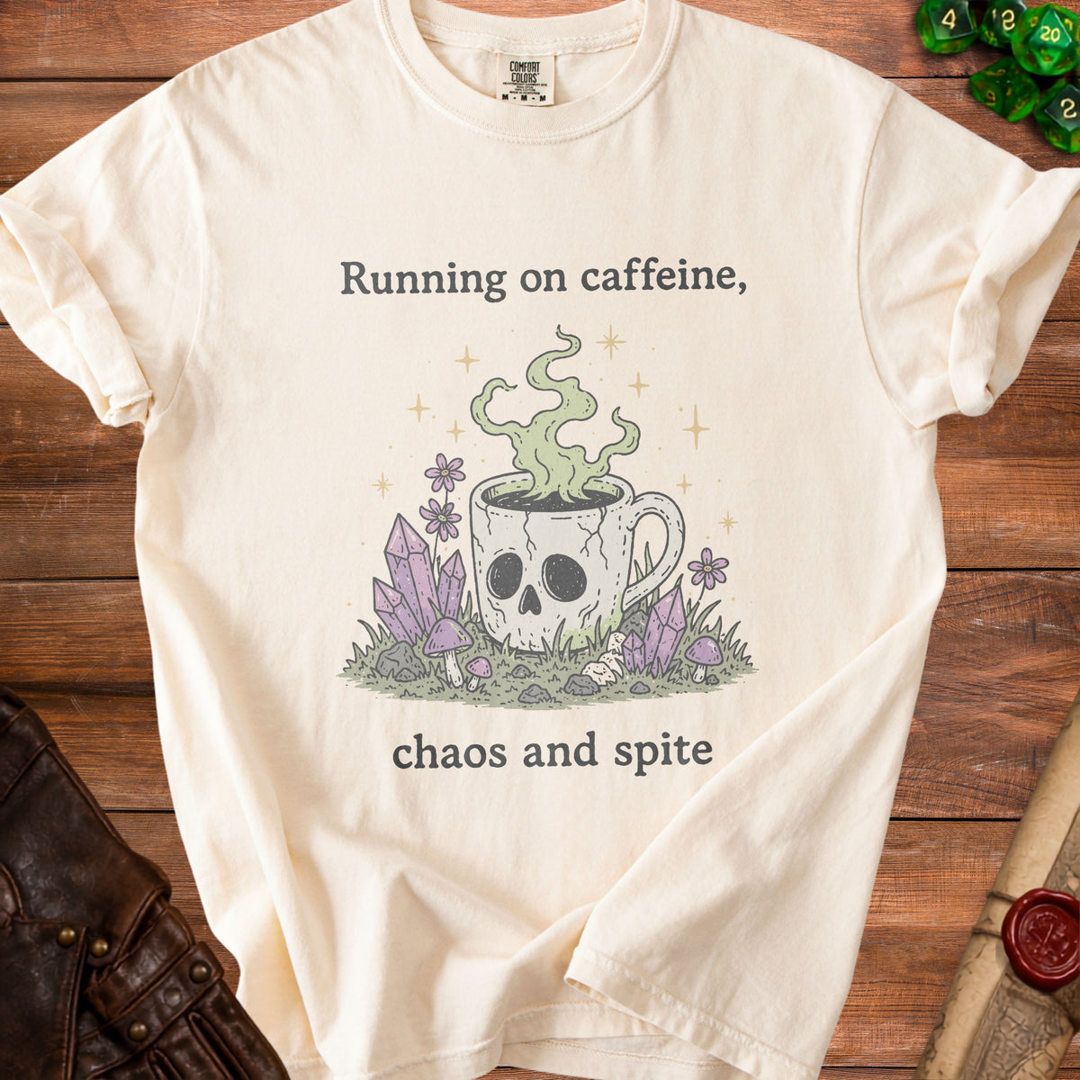 T-shirt with skull mug graphic and text "Running on caffeine, chaos and spite."