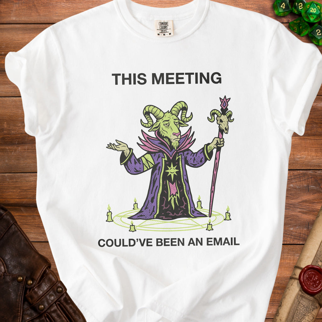 White t-shirt with text "THIS MEETING COULD'VE BEEN AN EMAIL" and a goat wizard graphic.