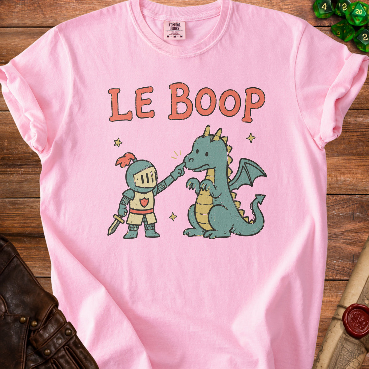 Pink t-shirt with "LE BOOP" and a knight booping a dragon illustration.