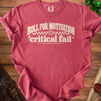 Pink t-shirt with "Roll for Motivation, Critical Fail" text and D20 dice.