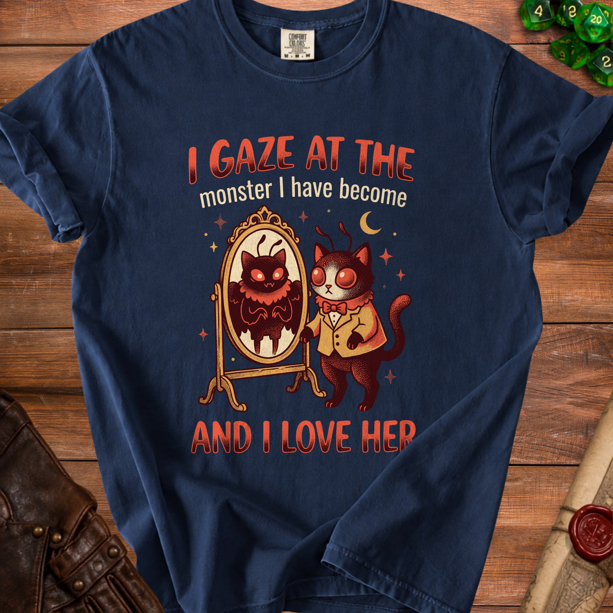Navy t-shirt with text "I gaze at the monster I have become and I love her"