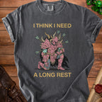 I Think I Need A Long Rest t-shirt with pink knight and arrows graphic.