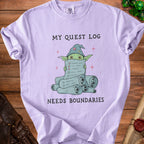 Purple t-shirt with wizard goblin holding a quest log saying "MY QUEST LOG NEEDS BOUNDARIES."