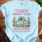 Light blue t-shirt with a cartoon dragon, woods, and text about meeting up.