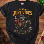 Black t-shirt with knight riding horse, "No Map Just Vibes" text, and skull.
