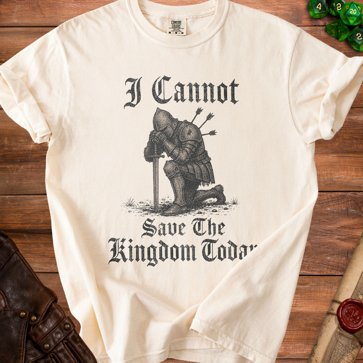 Cream t-shirt with knight graphic and text "I Cannot Save The Kingdom Today".