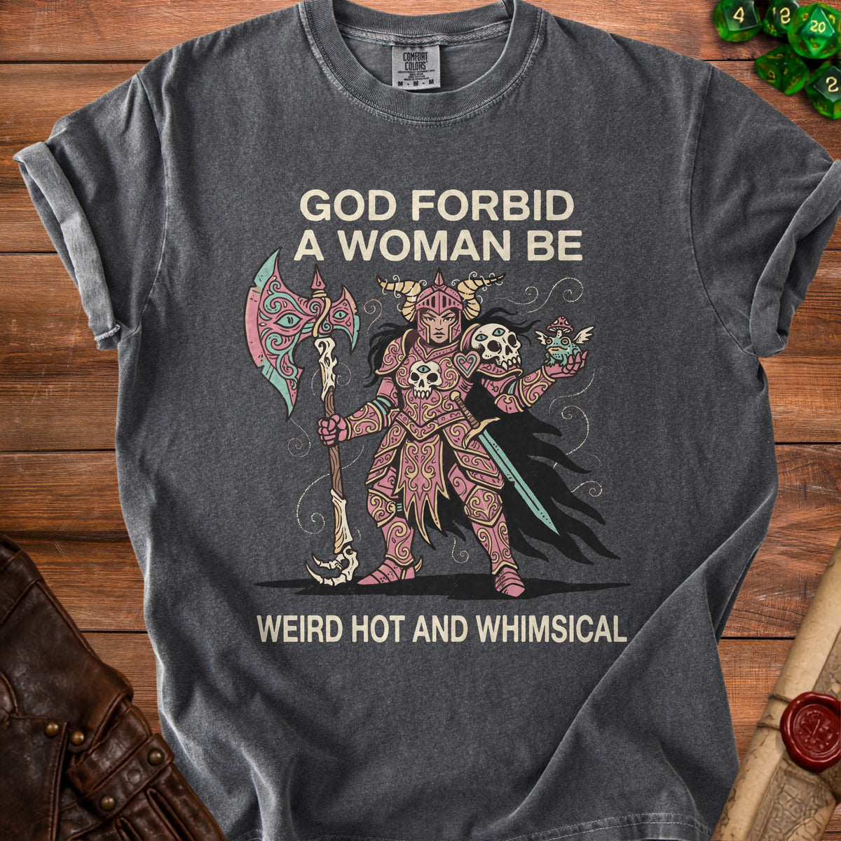 Gray t-shirt with graphic of armored warrior and text "God forbid a woman be weird hot and whimsical."