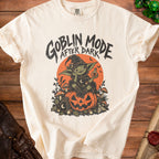 Cream t-shirt with "Goblin Mode After Dark" text and goblin graphic.