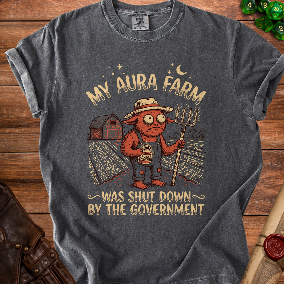 Dark grey t-shirt with text "My Aura Farm Was Shut Down By The Government".