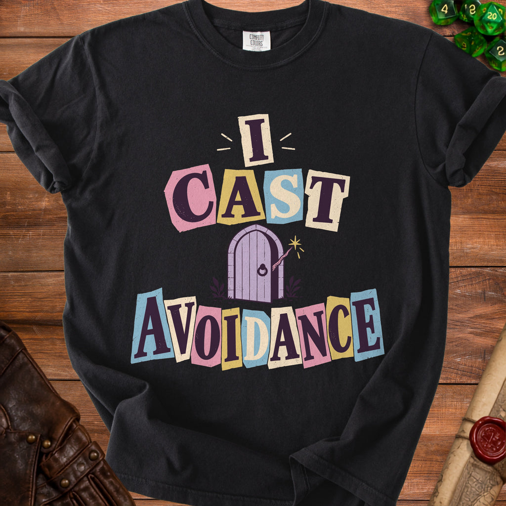 Black t-shirt with "I CAST AVOIDANCE" in colorful block letters over a purple door.