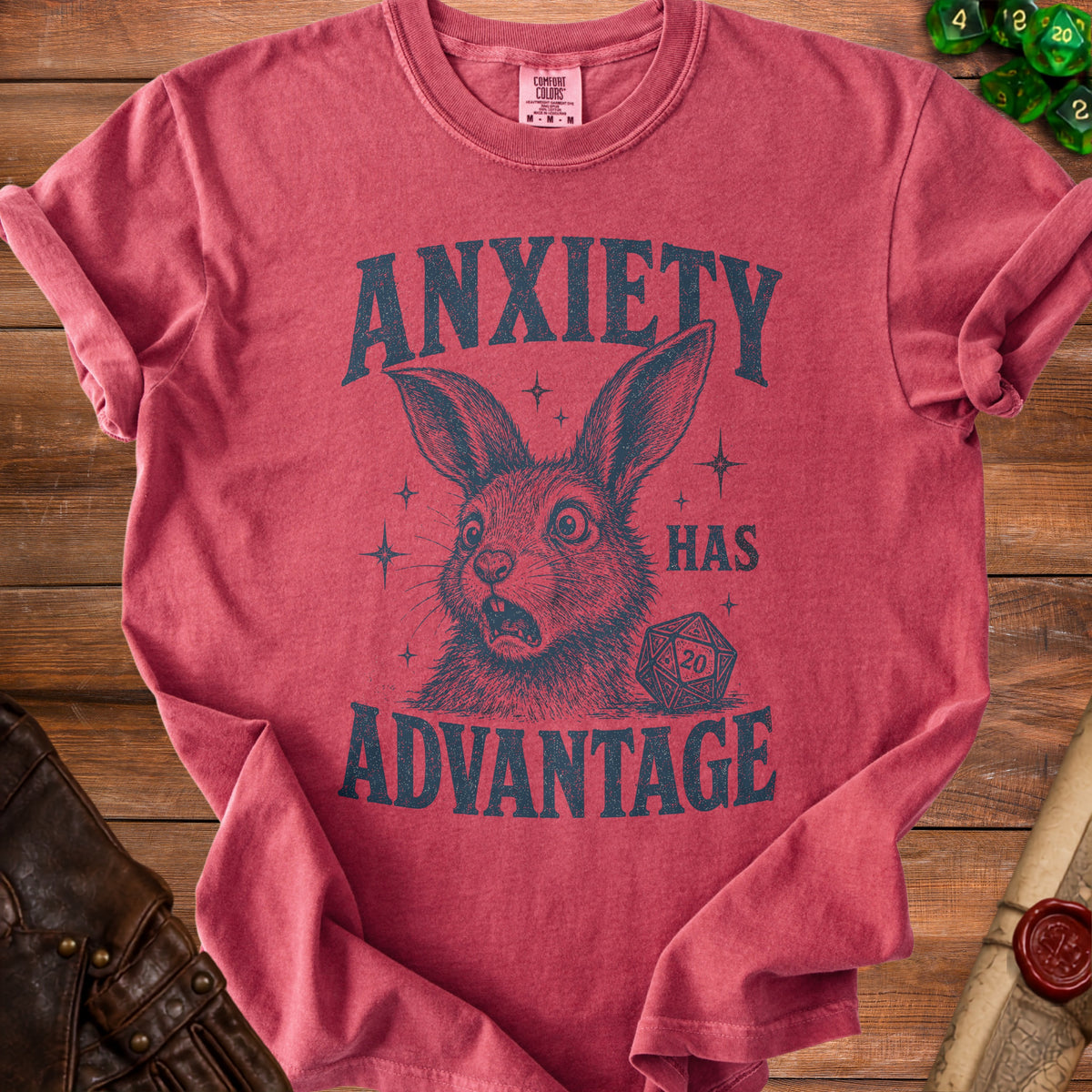 Red t-shirt with distressed graphic of a startled rabbit and text "ANXIETY HAS ADVANTAGE" and a d20 die.