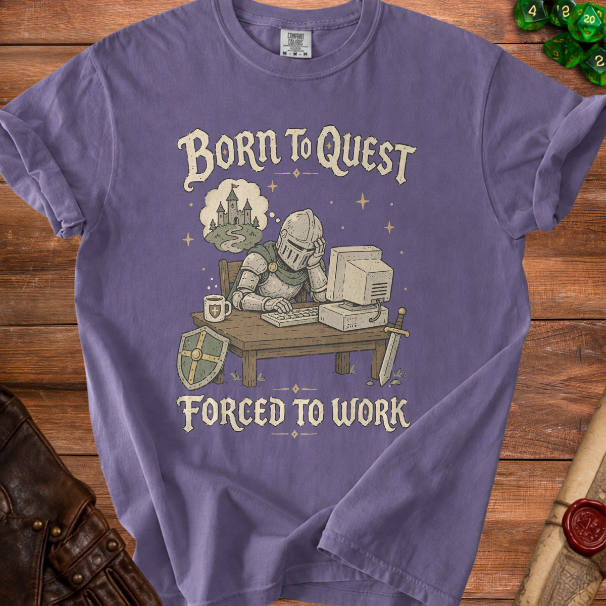 Purple t-shirt with "Born to Quest, Forced to Work" text and knight at computer.