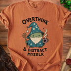 T-shirt with cartoon wizard holding coffee and text "OVERTHINK & DISTRACT MYSELF."