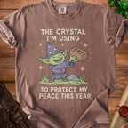 Goblin wizard holding a brick with text: "The crystal I'm using to protect my peace this year."