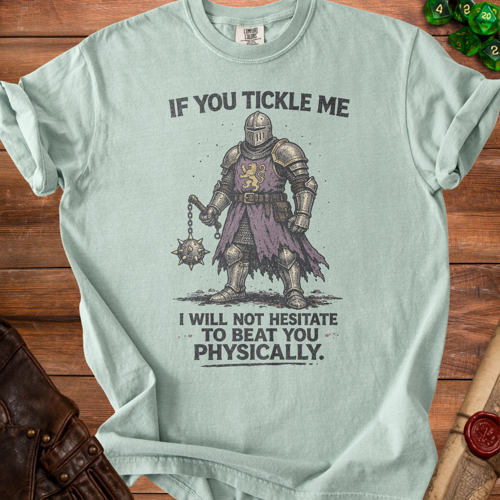 Light blue t-shirt with knight graphic and text: "IF YOU TICKLE ME I WILL NOT HESITATE TO BEAT YOU PHYSICALLY."