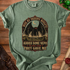 Green t-shirt with mothman graphic and text: "wish my parents would've added some nepo to the tism they gave me".