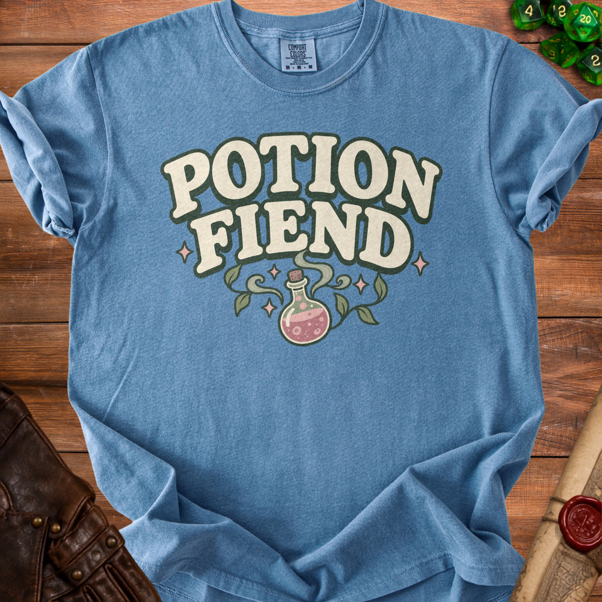 Blue t-shirt with "Potion Fiend" text and potion bottle graphic.