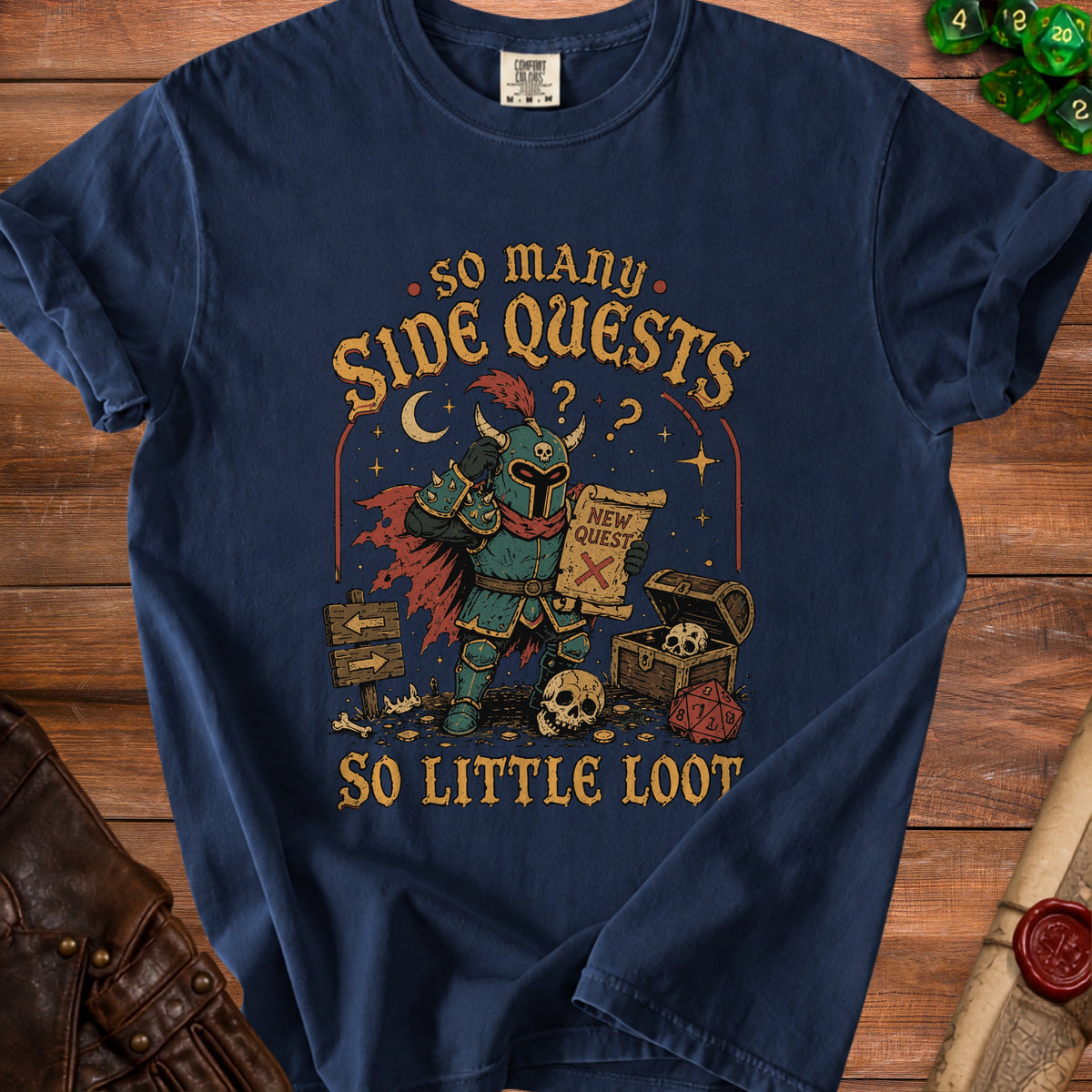 Dark blue t-shirt with a knight holding a "New Quest" scroll, text "so many side quests so little loot".