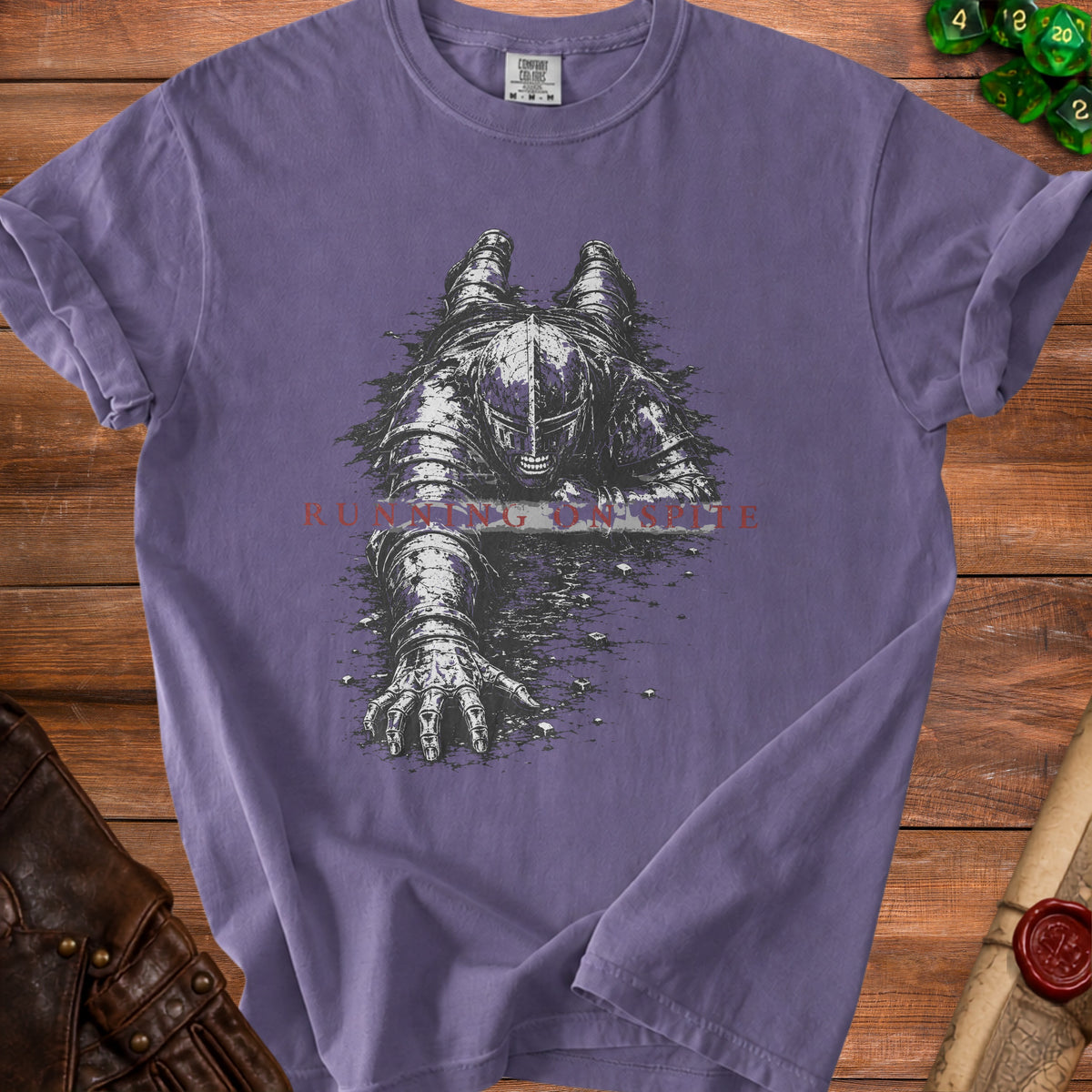 Purple t-shirt with a knight in armor crawling artwork and "RUNNING ON SPITE" text.