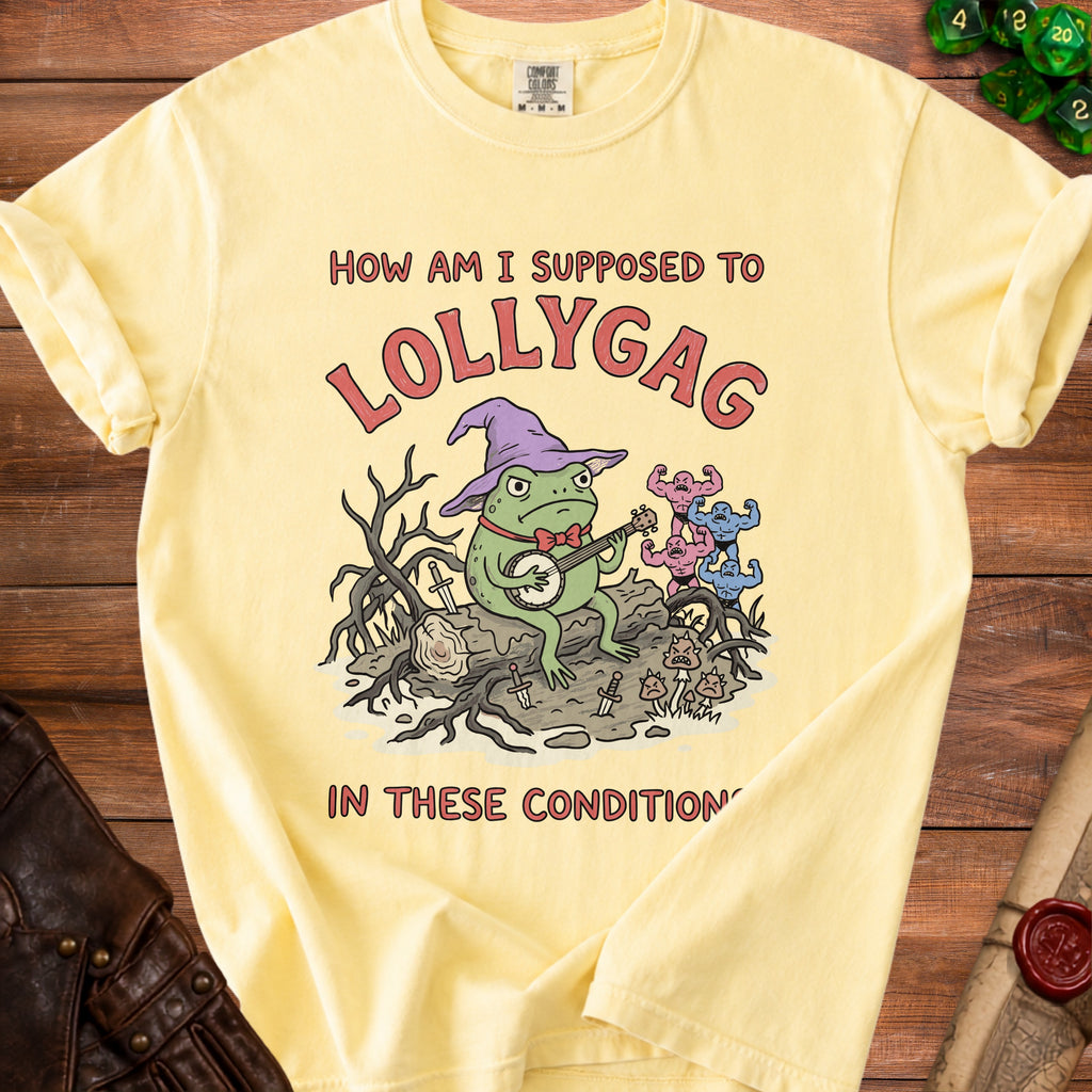Yellow t-shirt with cartoon of frog in hat playing banjo, text "How am I supposed to Lollygag in these conditions".