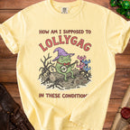 Yellow t-shirt with cartoon of frog in hat playing banjo, text "How am I supposed to Lollygag in these conditions".