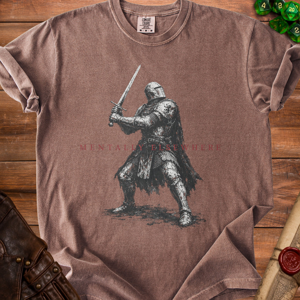 Brown t-shirt with knight illustration and "MENTALLY ELSEWHERE" text.
