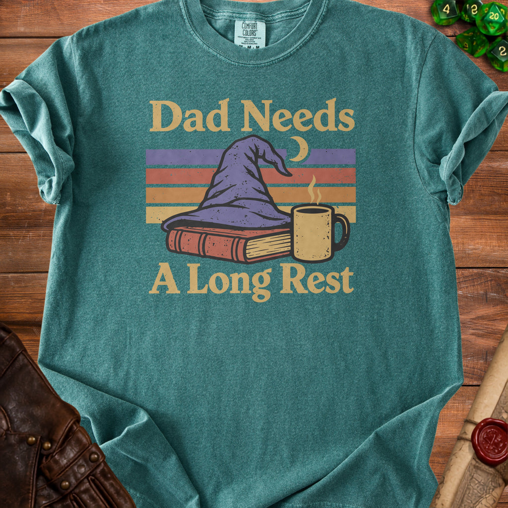 Teal t-shirt with "Dad Needs A Long Rest" text and wizard hat graphic.
