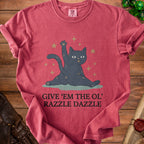 Red t-shirt with a cartoon cat raising a paw and text "GIVE 'EM THE OL' RAZZLE DAZZLE".