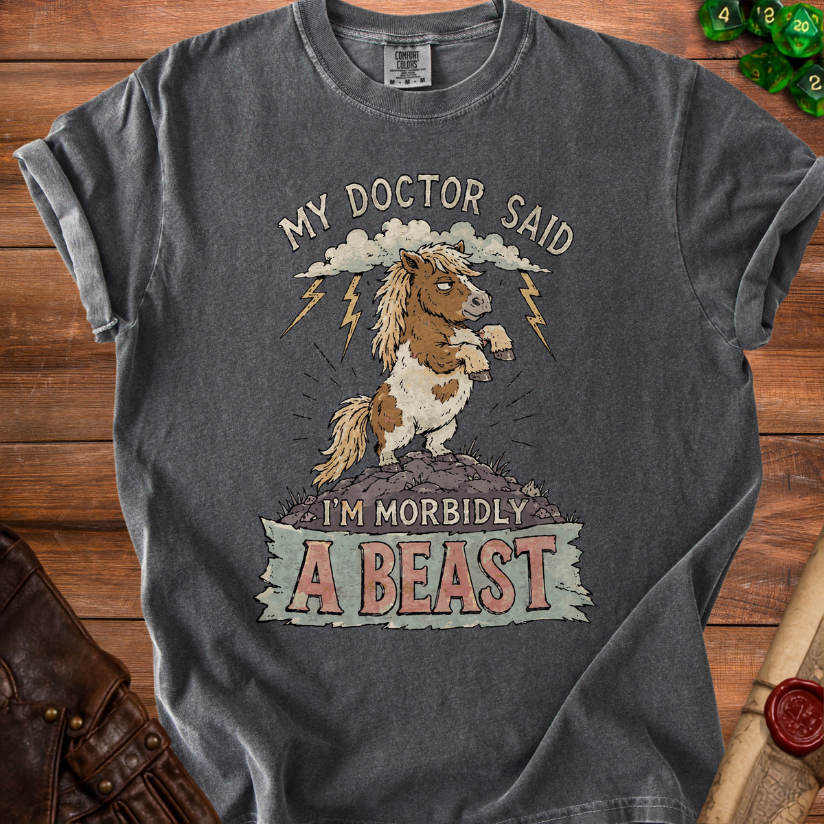 Gray t-shirt with a cartoon pony graphic and text "MY DOCTOR SAID I'M MORBIDLY A BEAST."