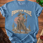 Blue t-shirt with "Frontier Mage" text and illustration of a western witch.