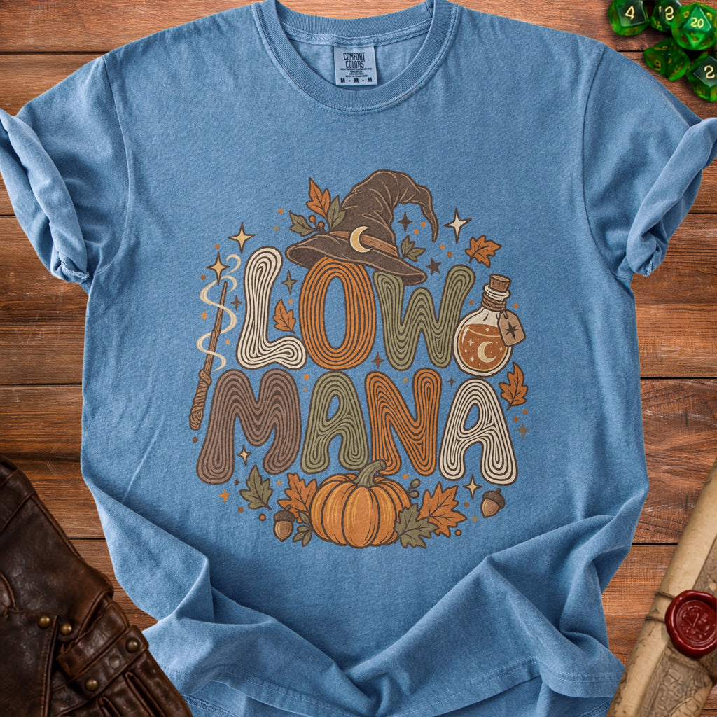 Blue t-shirt with "LOW MANA" text, witch hat, pumpkin, and potion bottle.