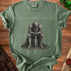 Green t-shirt with "overwhelmed" text and a drawing of a knight.