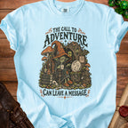 Light blue t-shirt with goblins, mushrooms, and text: "The Call to Adventure Can Leave a Message."