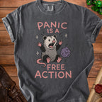 Graphic tee with possum and dice saying "Panic is a free action".