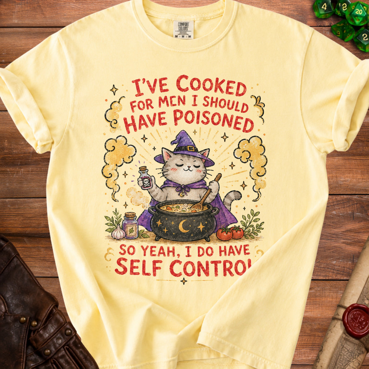Yellow t-shirt with a witch cat and text: "I've cooked for men I should have poisoned. So yeah, I do have self control."