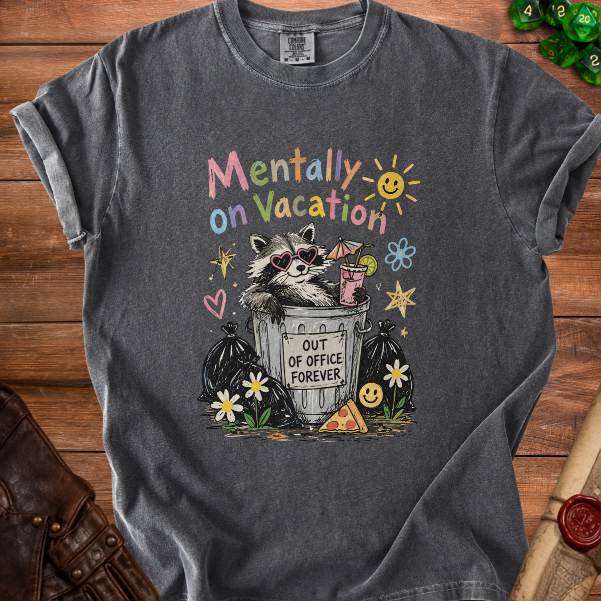 T-shirt graphic: Raccoon in trash can, "Mentally on Vacation," and "Out of Office Forever."