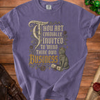 Purple t-shirt with "Thou Art Cordially Invited To Mind Thine Own Business" text and cat graphic.