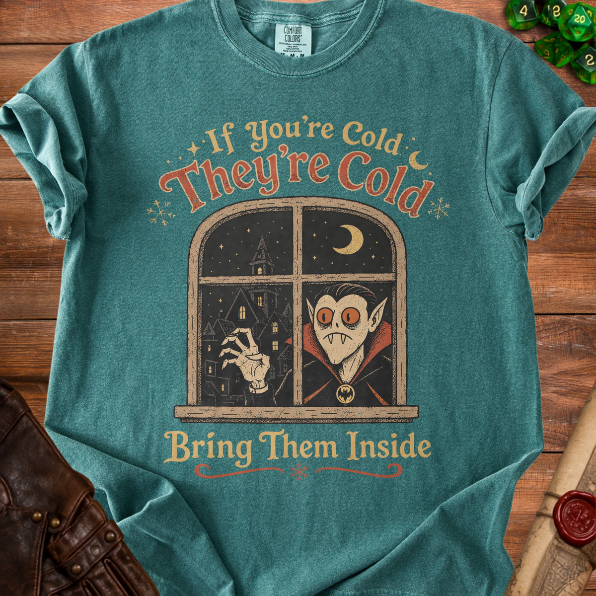 T-shirt with vampire looking out window, "If You're Cold They're Cold Bring Them Inside".